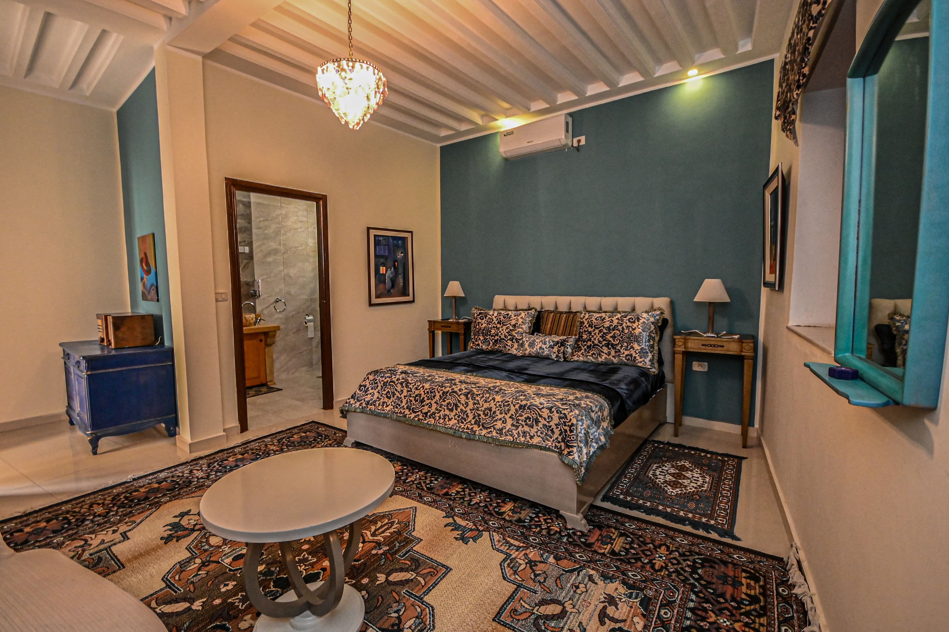 Douja chamber at Palais Harran — Velvet, brocade, deep teal